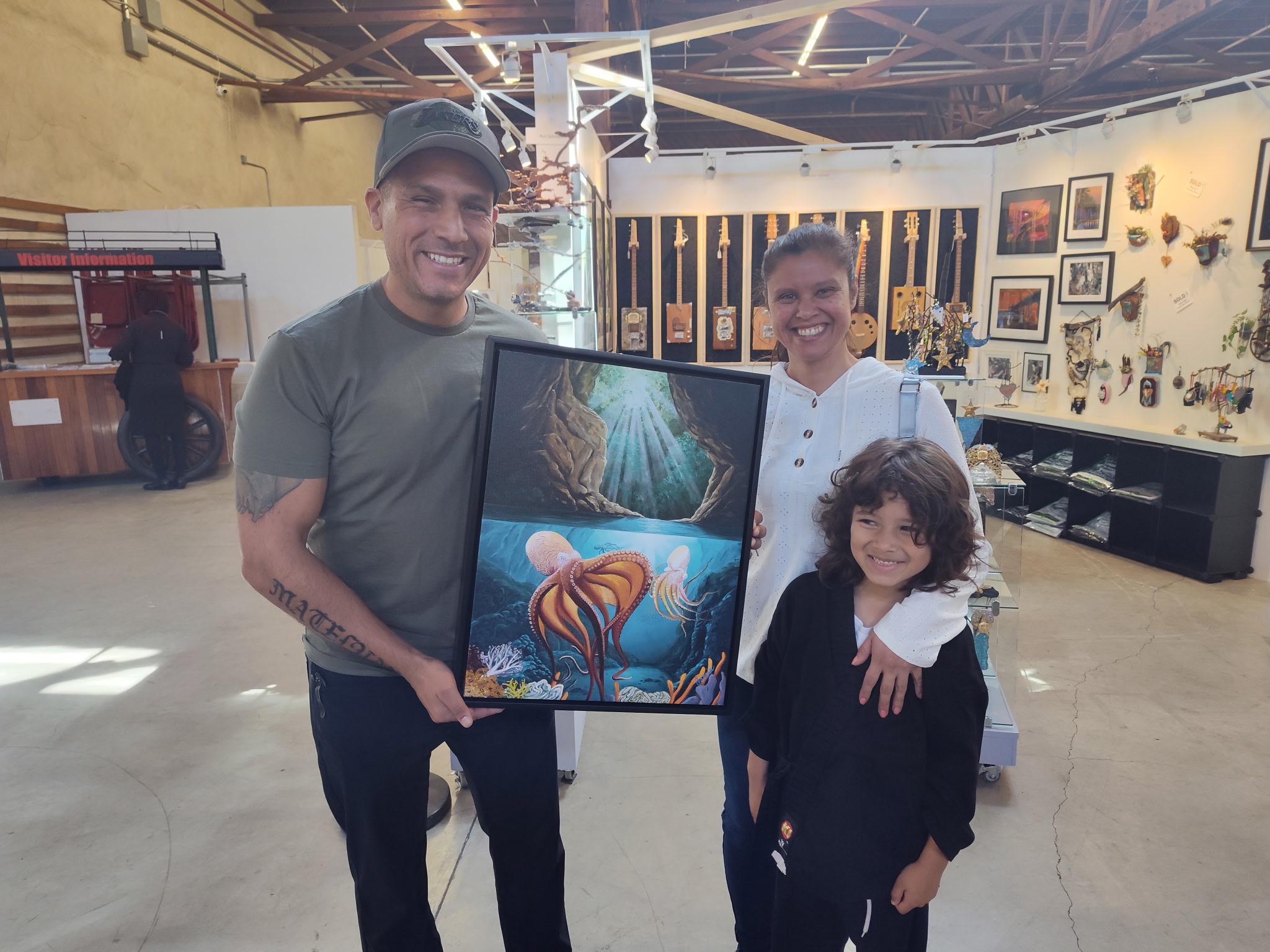 Person holding painting