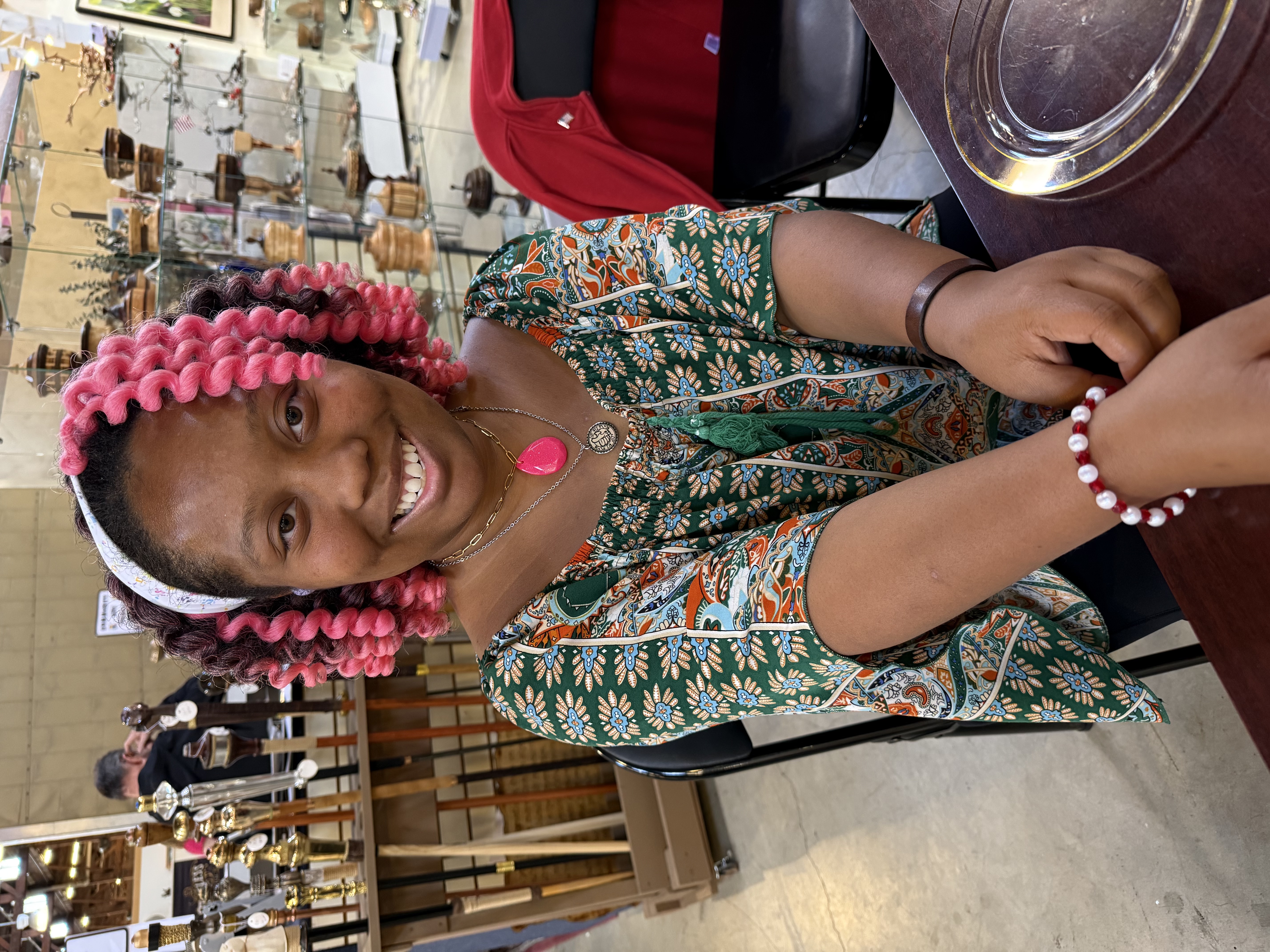 Child making jewelry