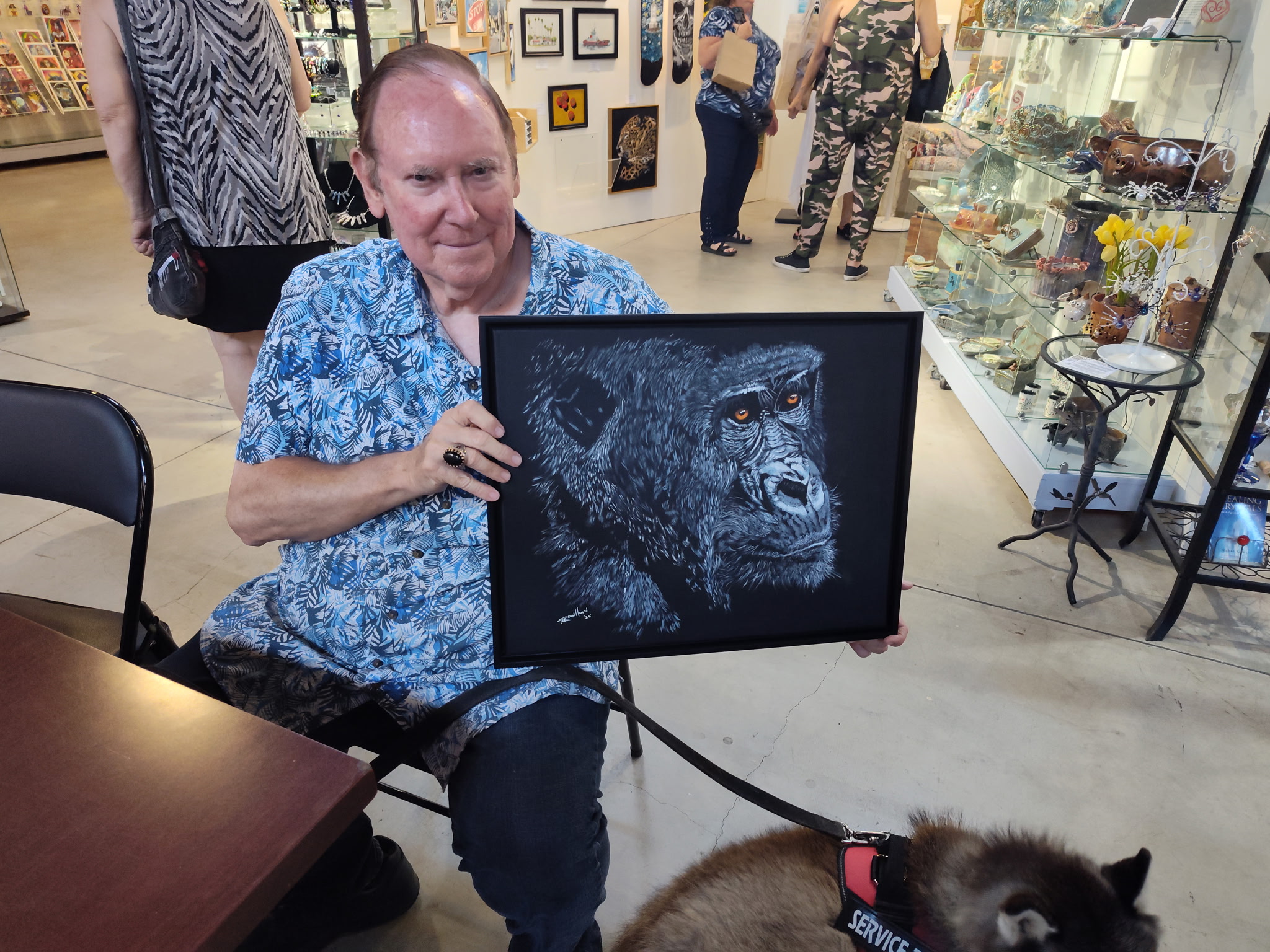 Person holding painting