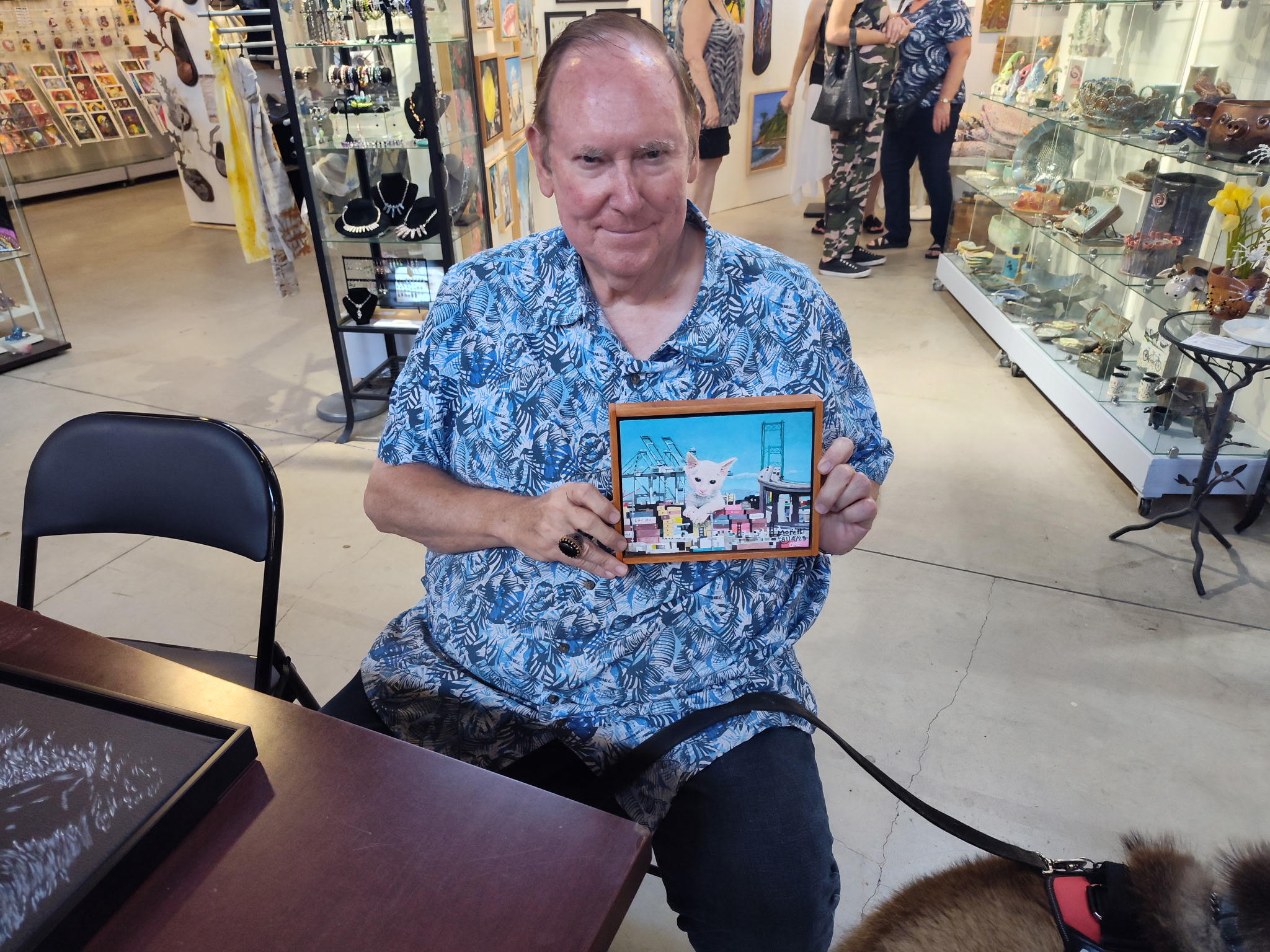 Person holding painting