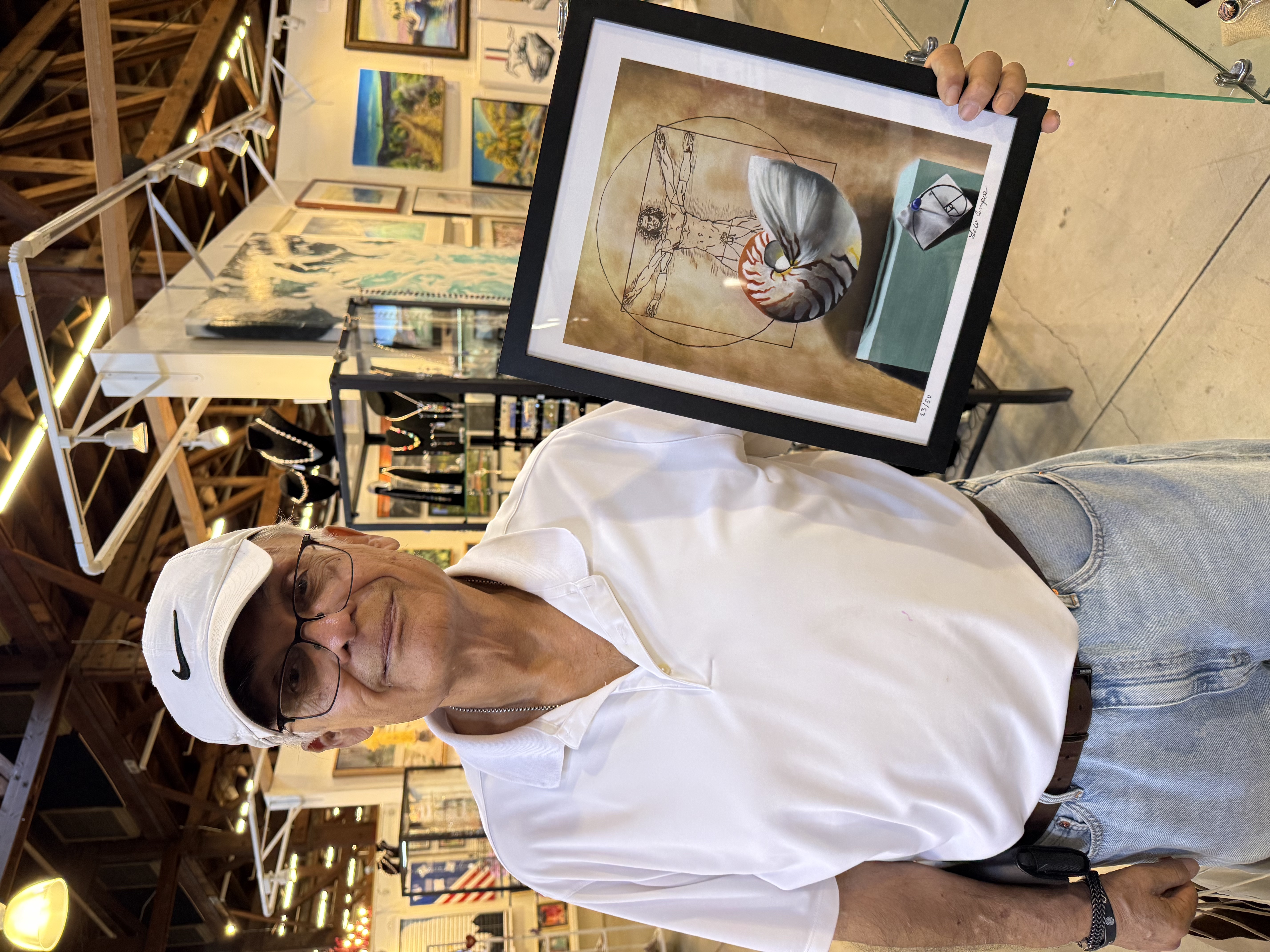 Person holding painting