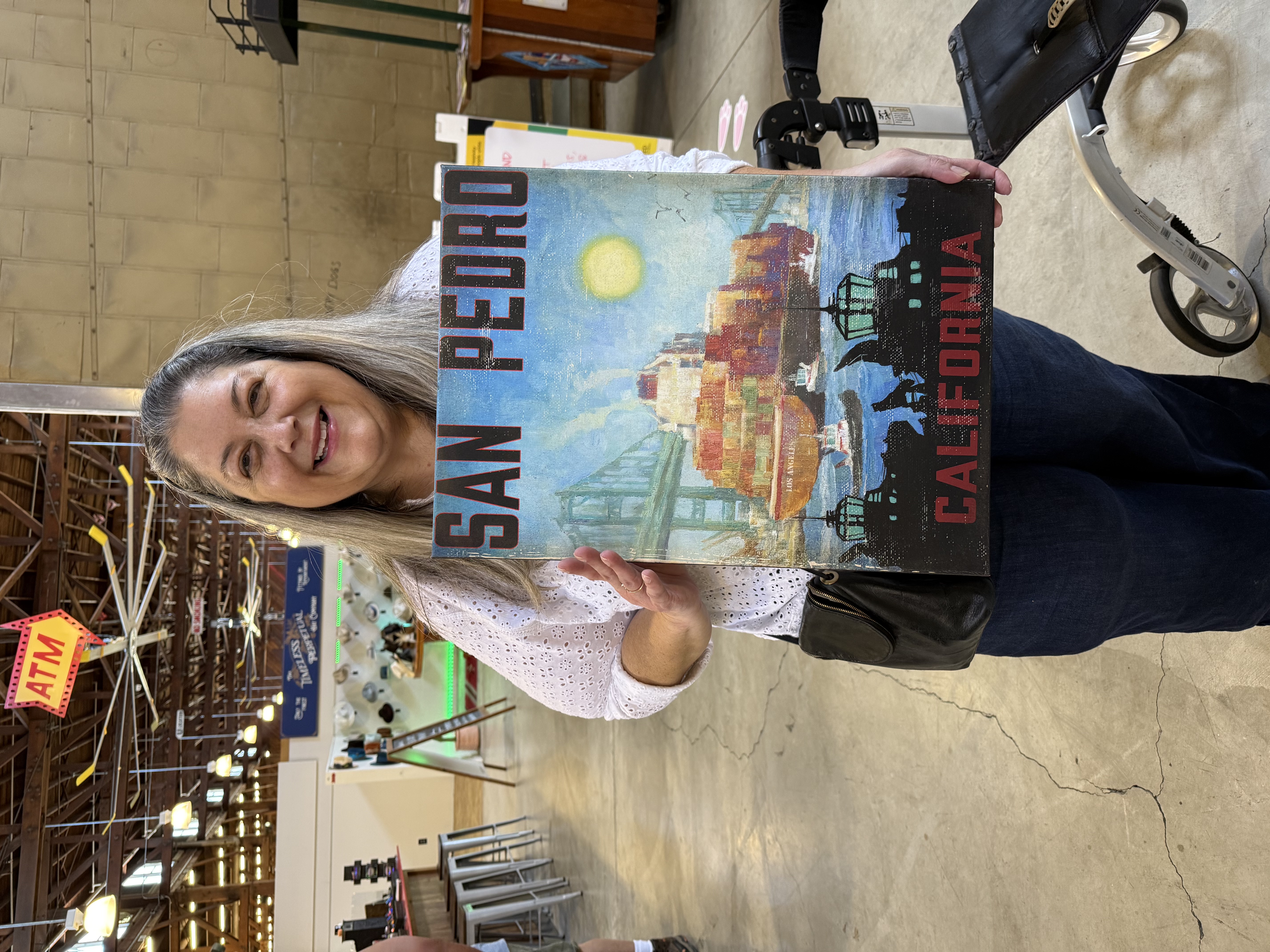 Person holding painting