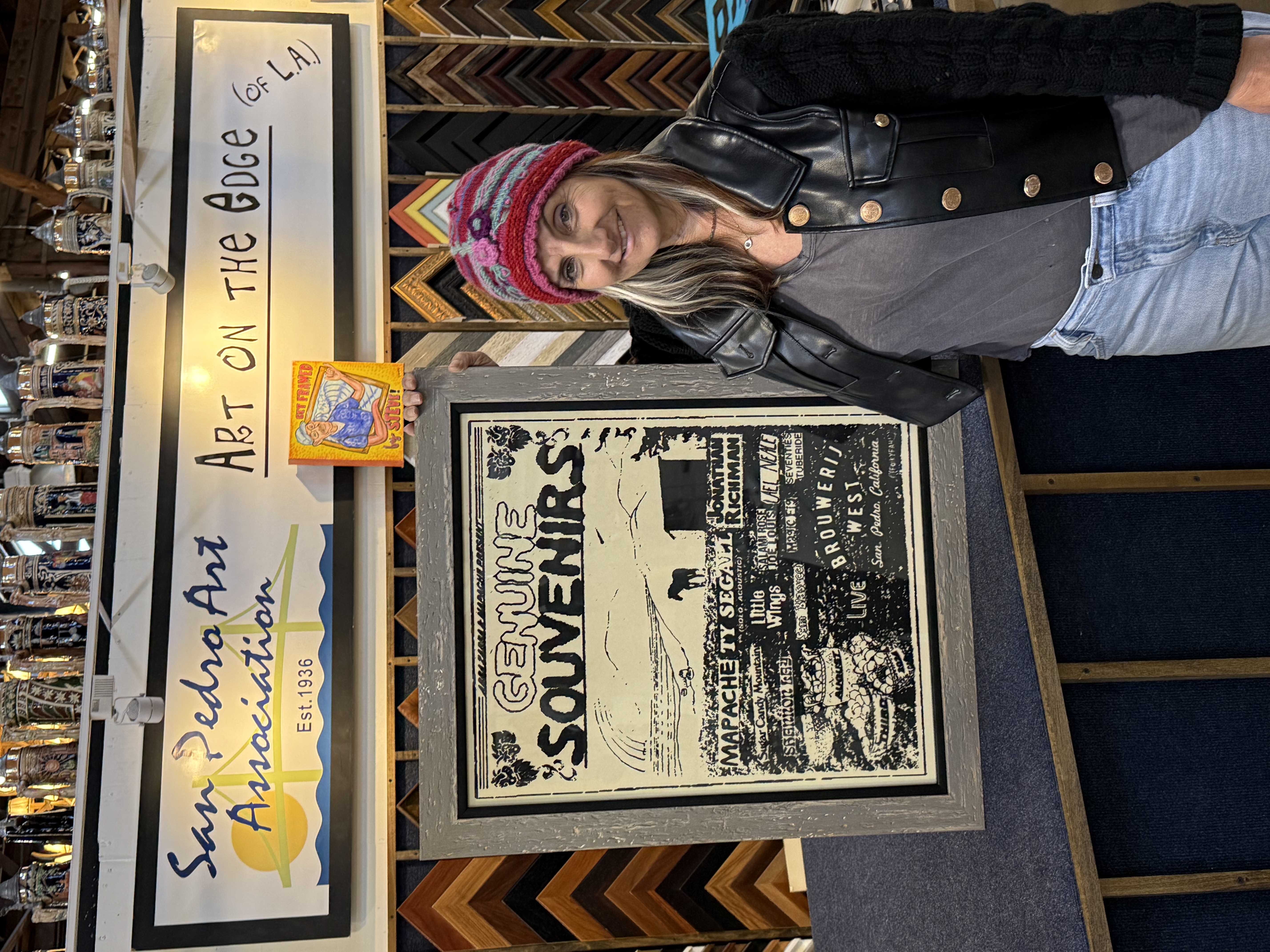 Person holding painting