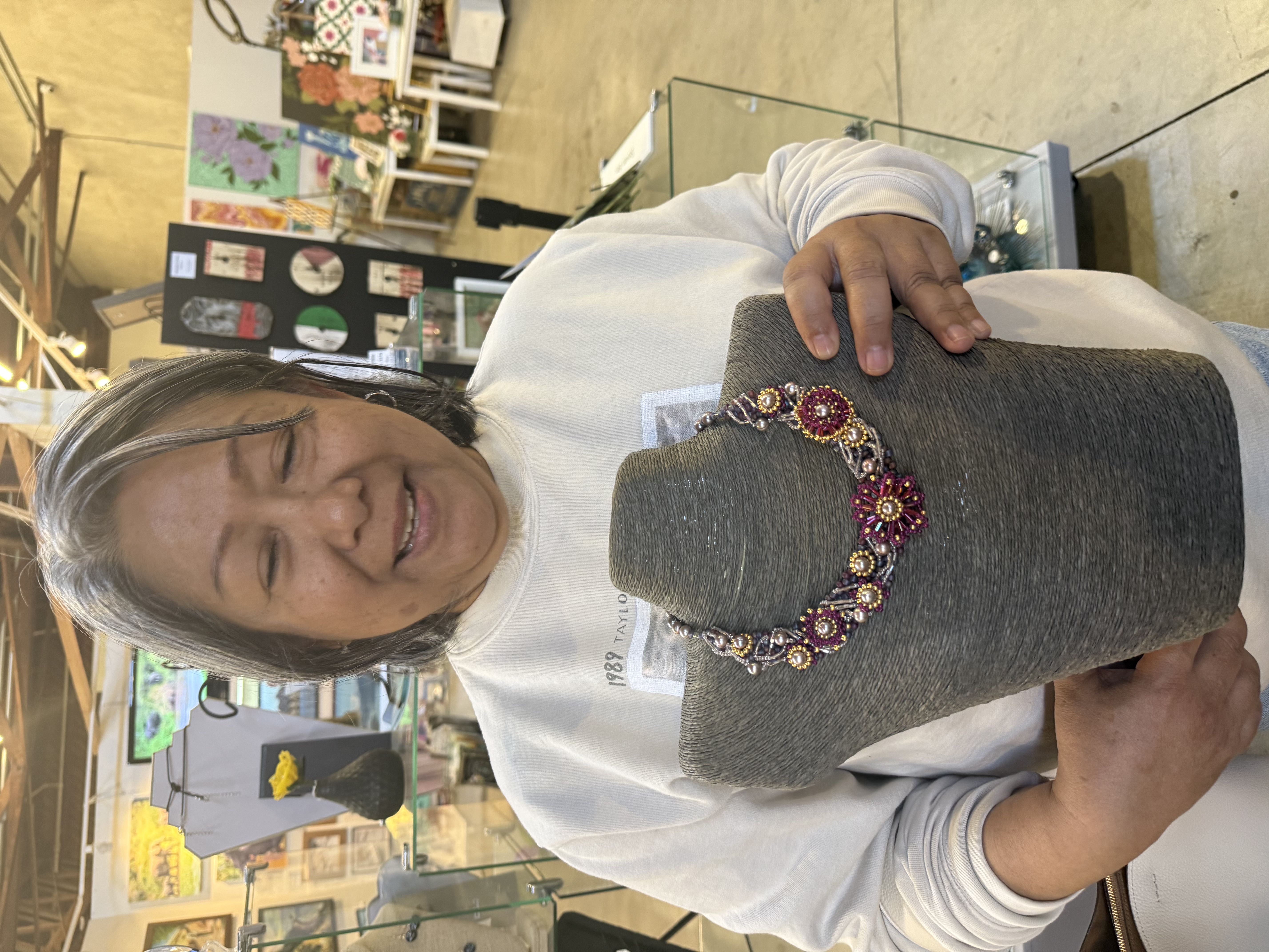 Person holding painting