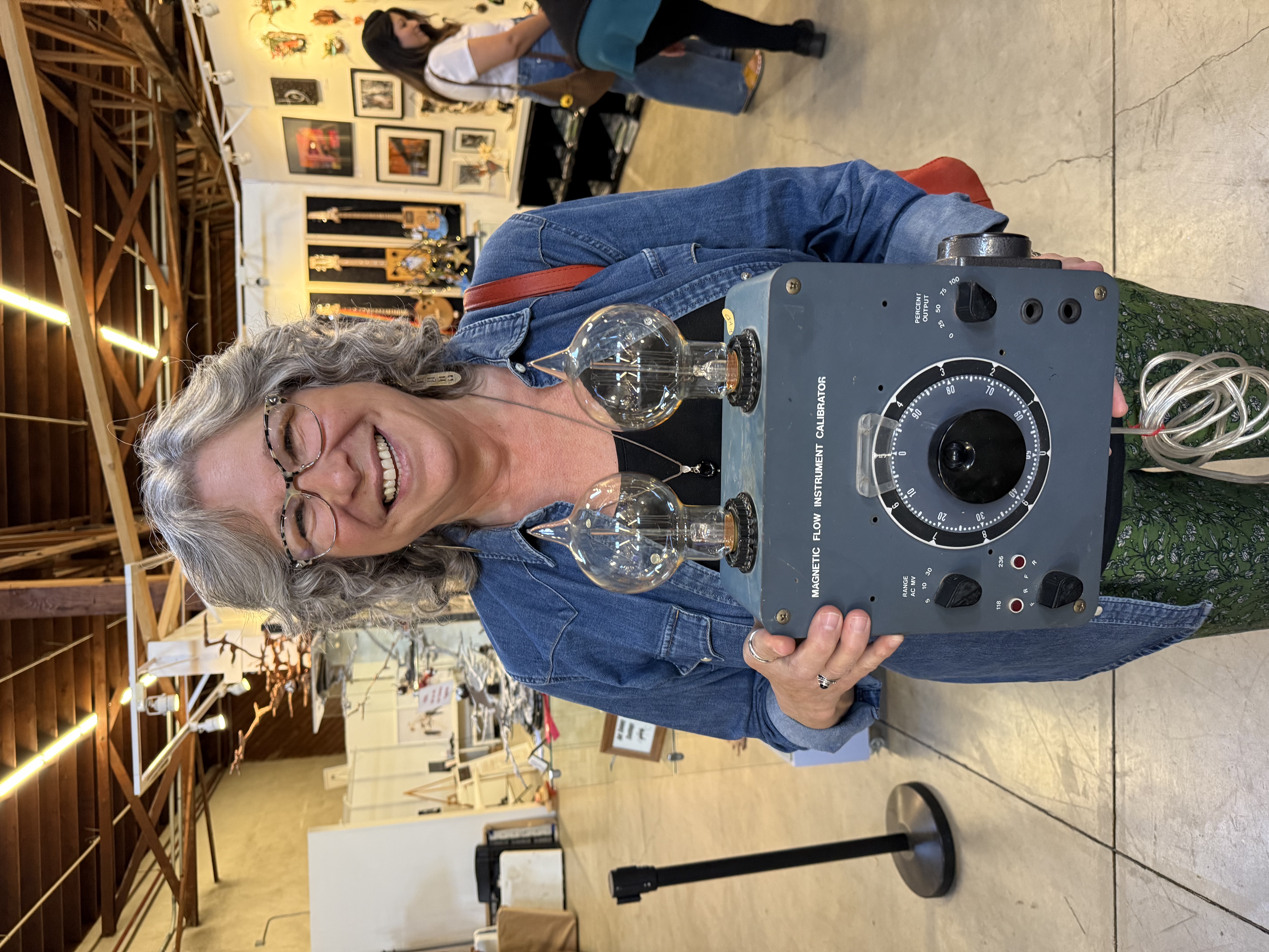 Person holding painting